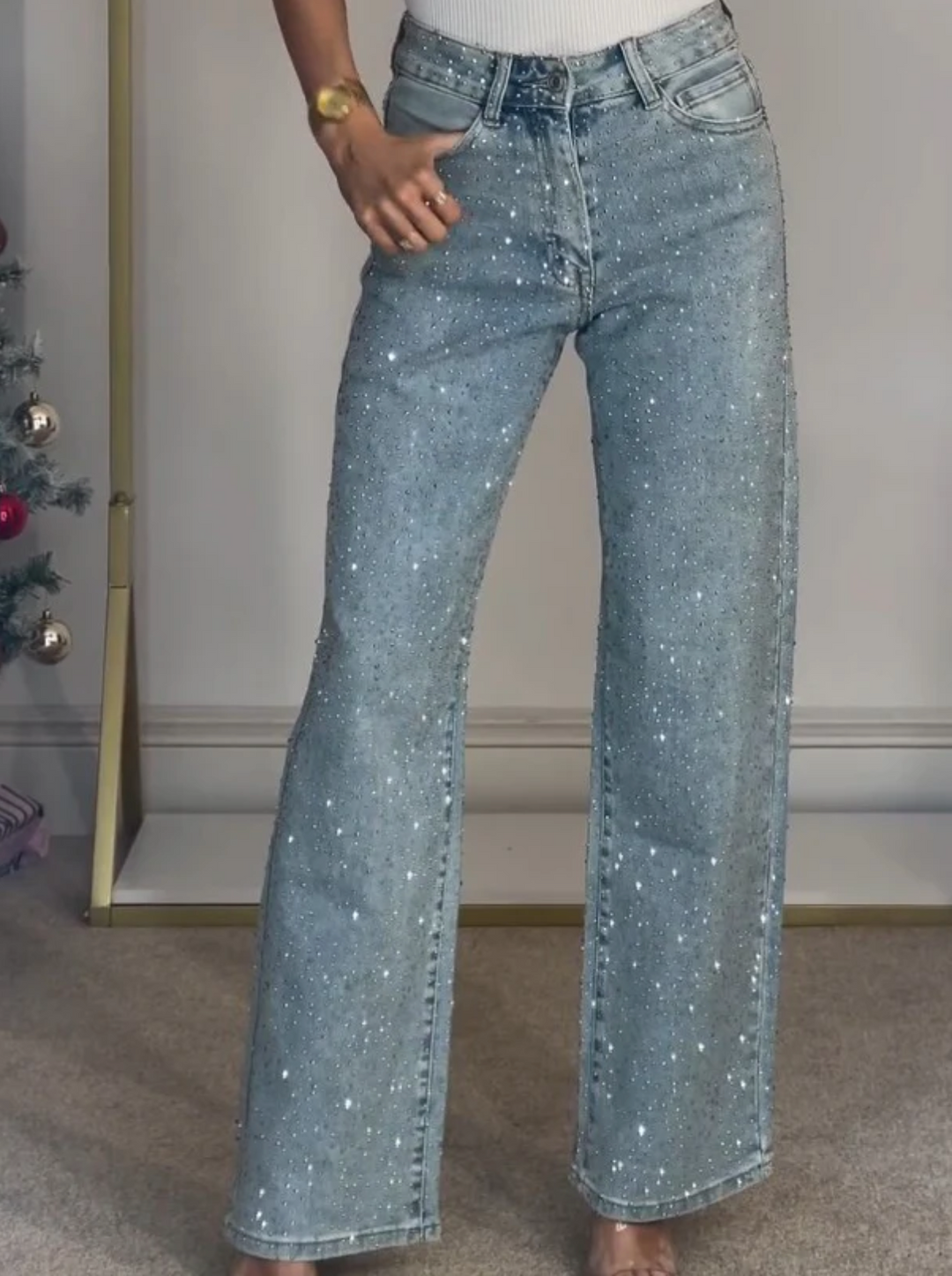 Versatile women's sparkle straight-leg high-waist jeans, perfect for a chic and trendy fashion outfit.