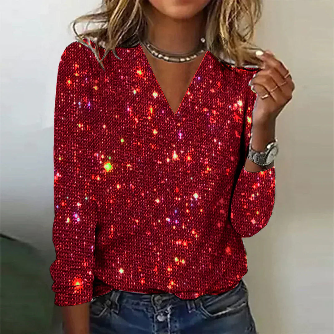 Glamorous women's V-neck sweater with shimmering sparkles, long sleeves, ideal for evening wear and party outfits.