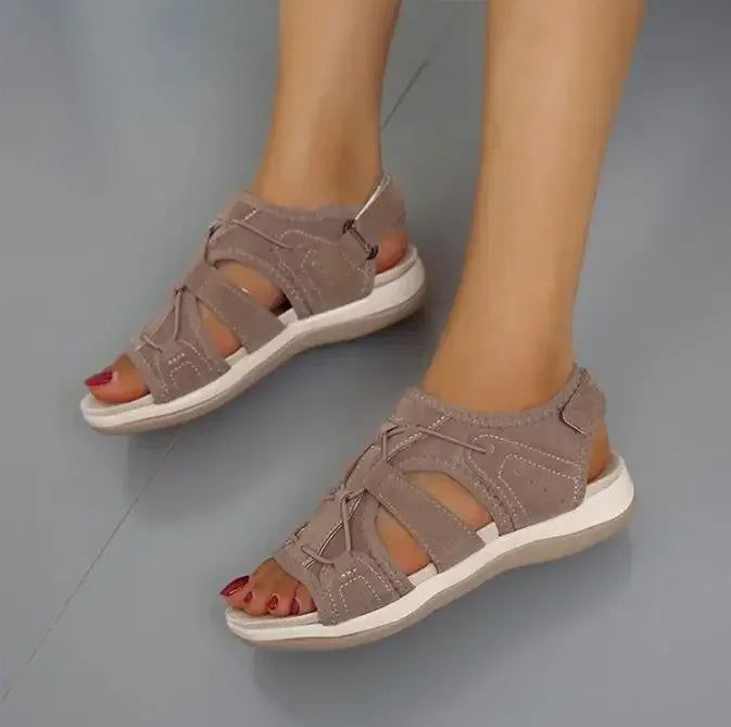 Adjustable strap detail on women's black sporty sandals, ensuring a secure fit