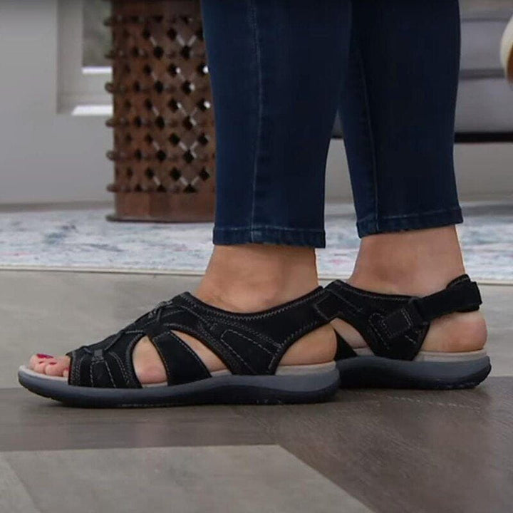 Back view of women's athletic sandals, black with comfortable heel strap