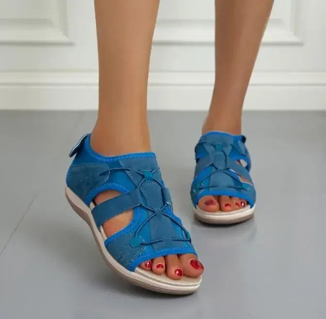 Women's black sporty sandals in a studio shot, highlighting their modern design