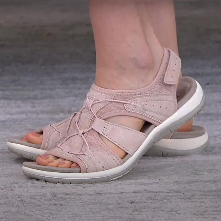 Top view of women's black sporty sandals, highlighting strap details & open-toe design