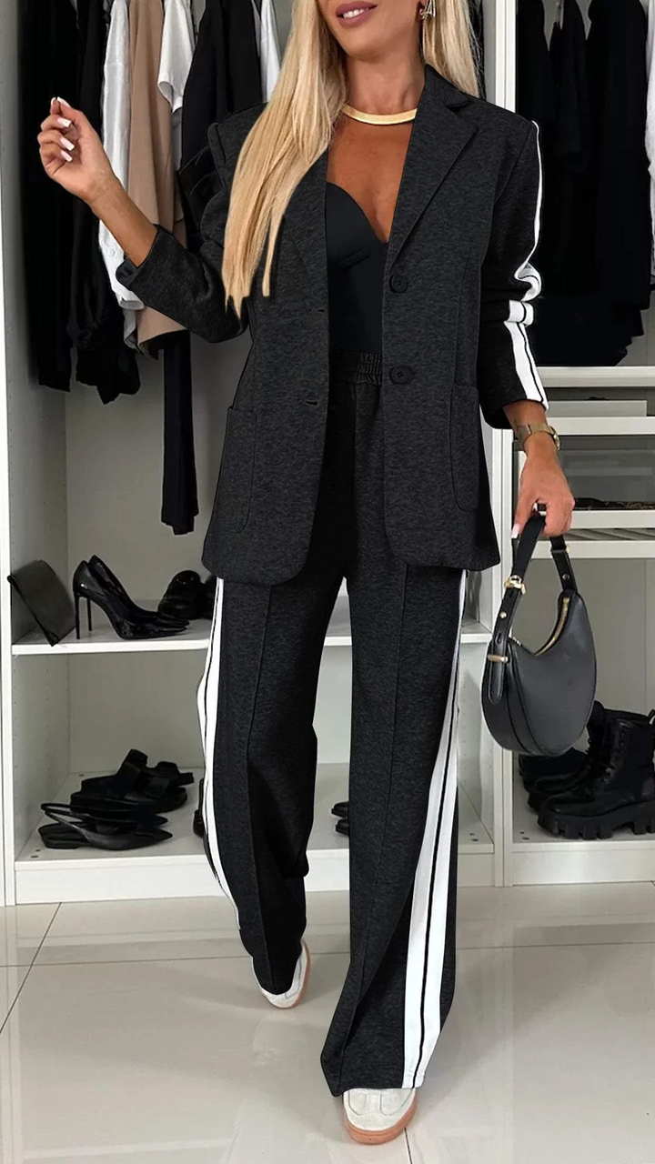 Versatile women's two-piece suit: sporty chic blazer & striped trousers, ideal for office or leisure wear.