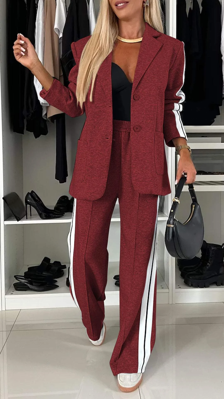 Casual elegant women's two-piece suit, featuring a stylish blazer and comfortable striped trousers for modern fashion.