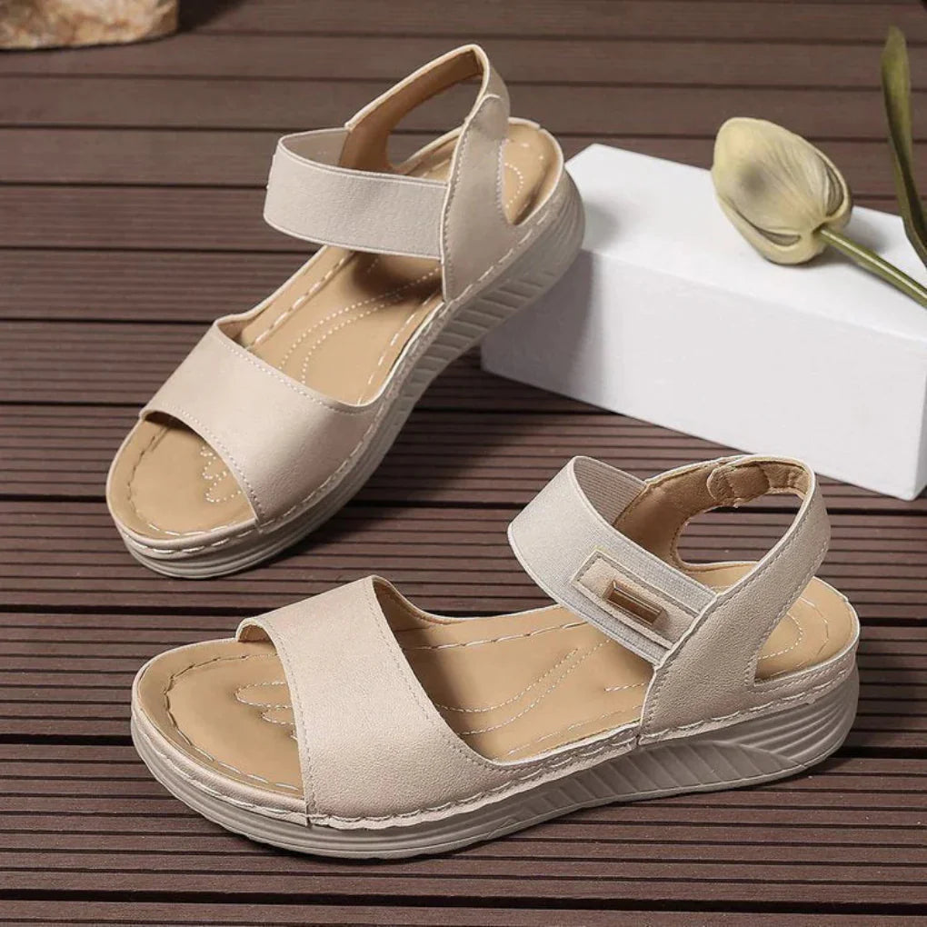 Casual women's open toe sandals with adjustable strap. Comfortable spring footwear for everyday.