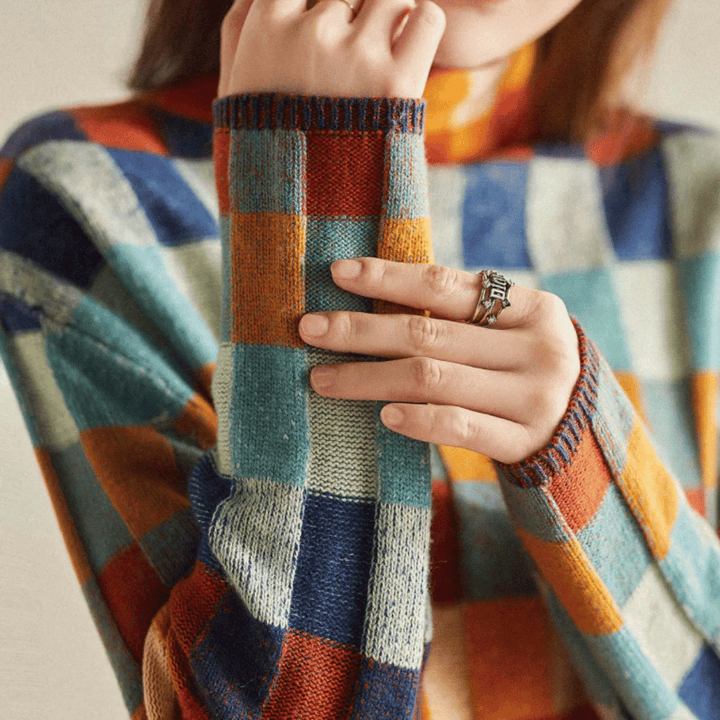 Soft knit women's spring turtleneck sweater in multi-colorblock check design