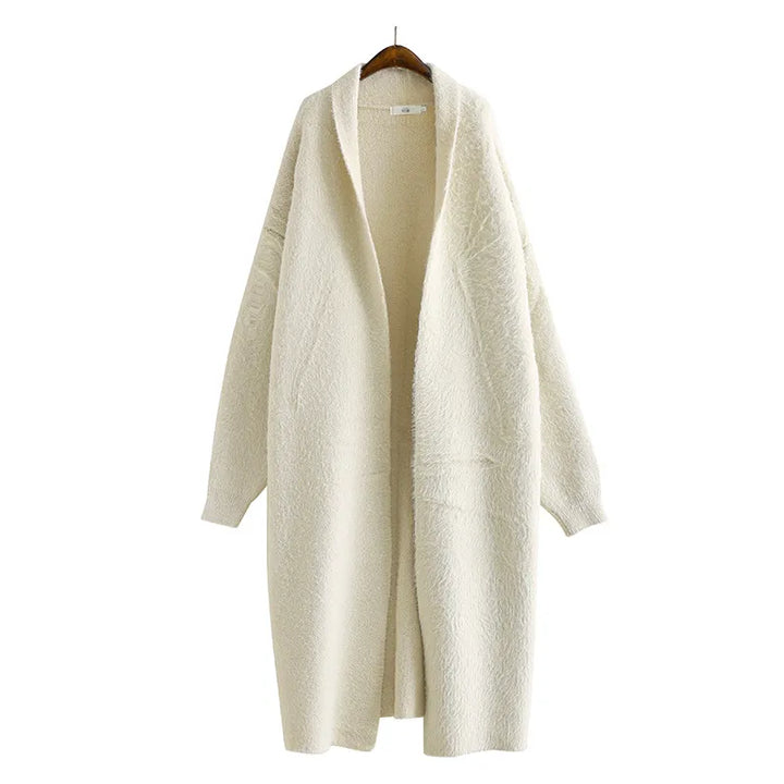 Casual women's open front longline cardigan, a versatile layering piece for spring fashion.