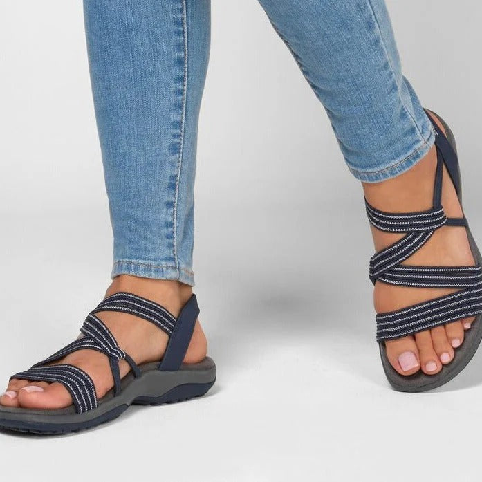 Lightweight women's comfort sandals, strappy design for breathable outdoor footwear.