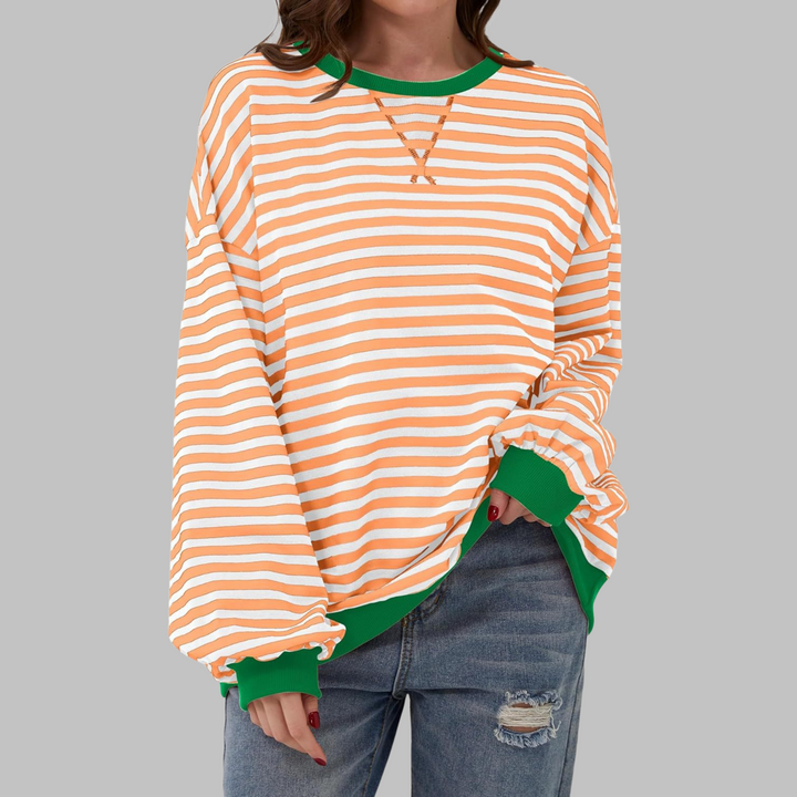 Textured image of a women's cotton blend crewneck jumper, highlighting the striped design and knit.
