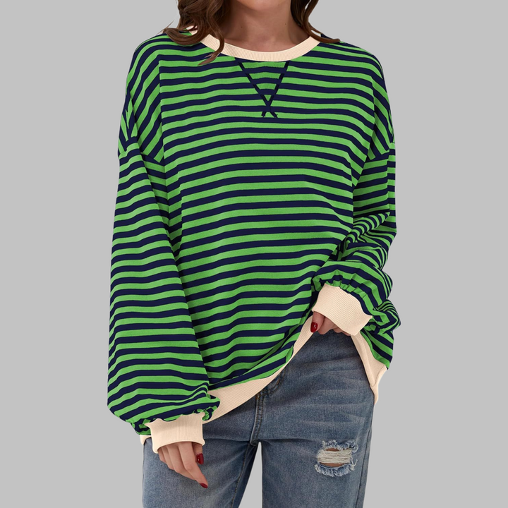 Detailed view of the crewneck and striped pattern on a women's cotton blend long sleeve jumper.