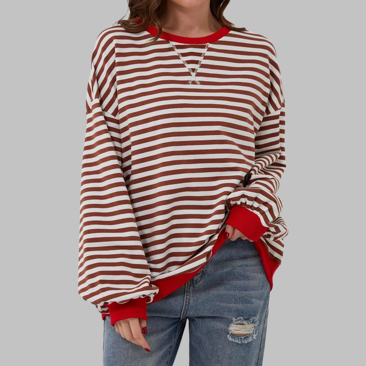 Vibrant, colorful striped cotton blend jumper for women, featuring a classic crewneck and loose fit.