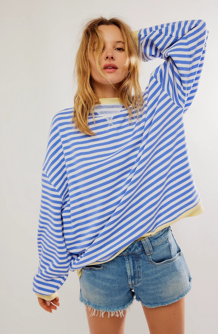 Comfortable long sleeve women's striped crewneck sweater, a versatile top for ladies apparel.