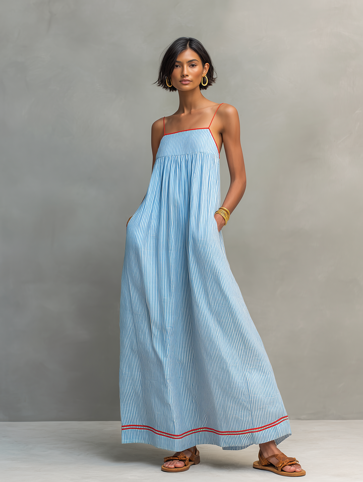 Lightweight women's striped maxi dress, sleeveless spaghetti strap design, perfect for warm weather fashion.