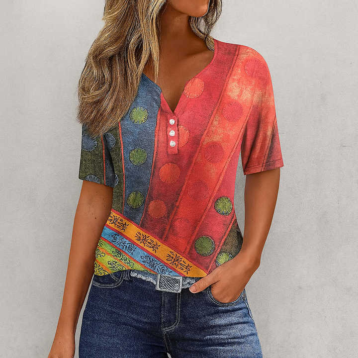 Relaxed fit striped V-neck top with button placket, ideal for women's casual summer wear