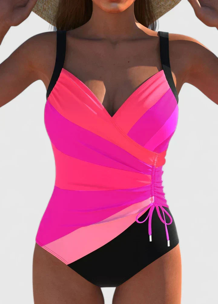 Flattering striped one-piece swimsuit with wrap front design
