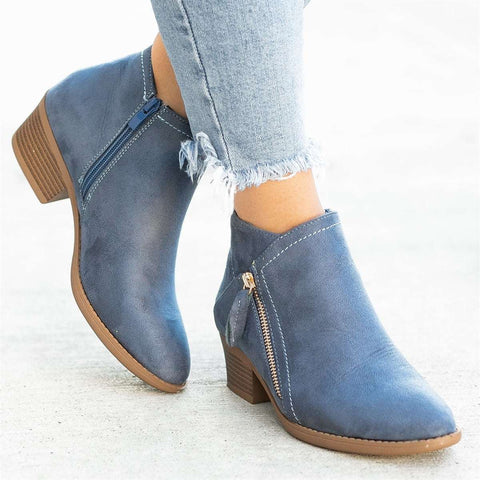 Stylish women's ankle boots in rich blue suede, featuring a practical side zipper design