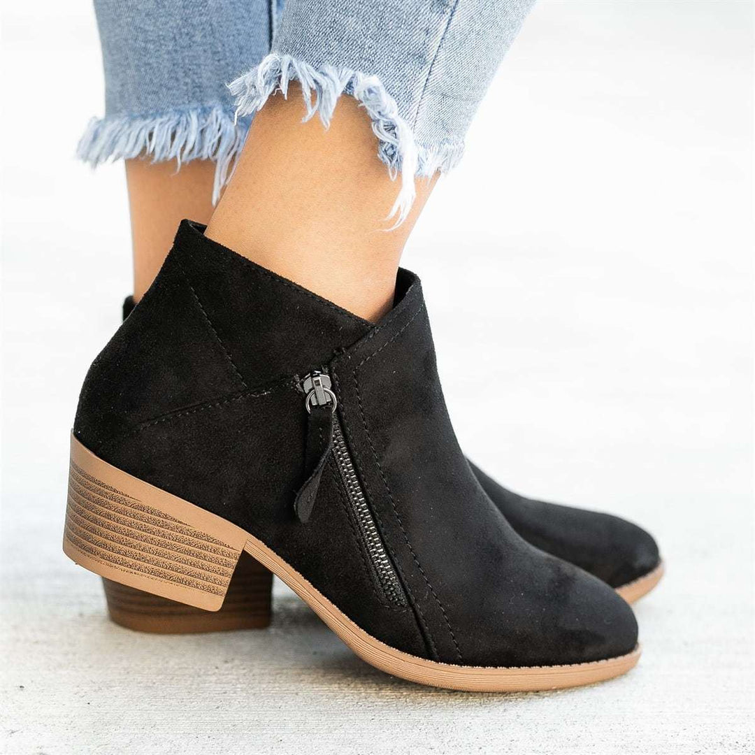 Casual women's tan suede ankle boots with durable sole and functional side zipper
