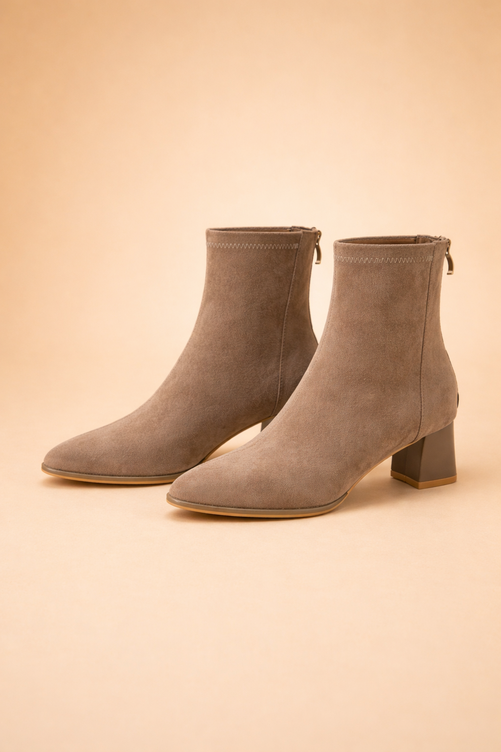 Chic women's classic ankle boots, essential stylish footwear for fall and winter fashion.