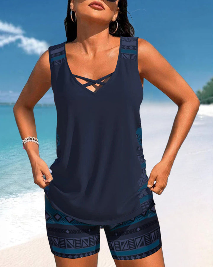 Two-piece women's tankini with elegant criss-cross neck. Comfortable & fashionable for beach or pool.