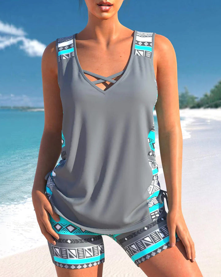 Women's vacation style criss-cross tankini. Comfortable two-piece set, perfect for poolside lounging.