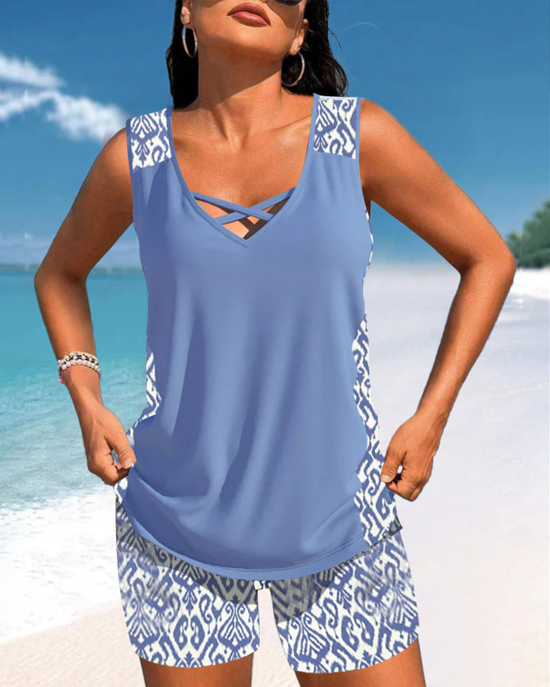 Printed women's tankini set featuring a trendy criss-cross neck. Your go-to summer fashion swimwear.