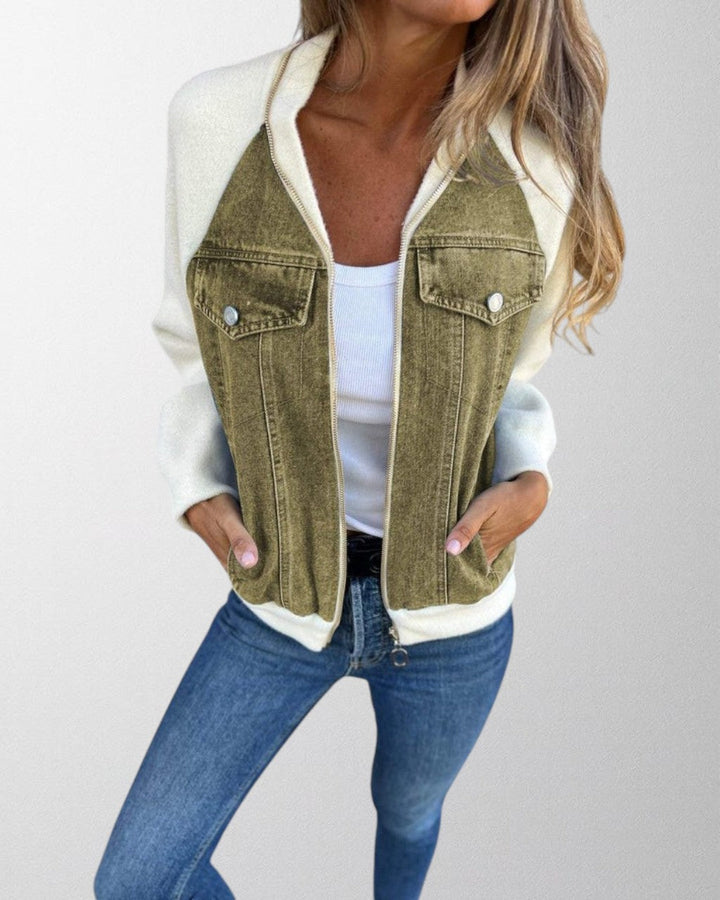 Back view of a women's modern denim jacket, emphasizing its versatile and comfortable design