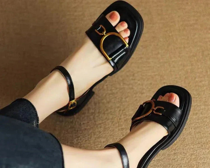 Stylish women's footwear: flat buckle sandals with a trendy square toe, great for casual outfits
