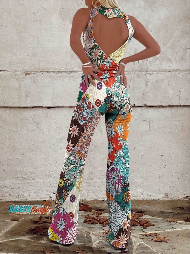 Comfortable one-piece floral denim jumpsuit for women, with a stylish split leg and front zipper closure.