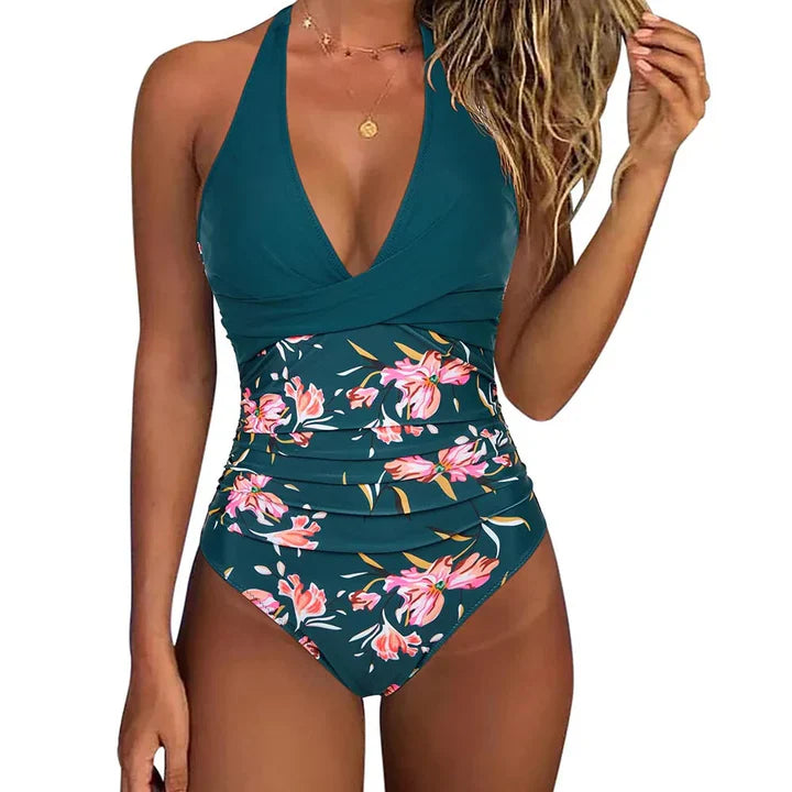 Women's stylish halter neck one-piece swimsuit. Perfect for beach & poolside confidence.