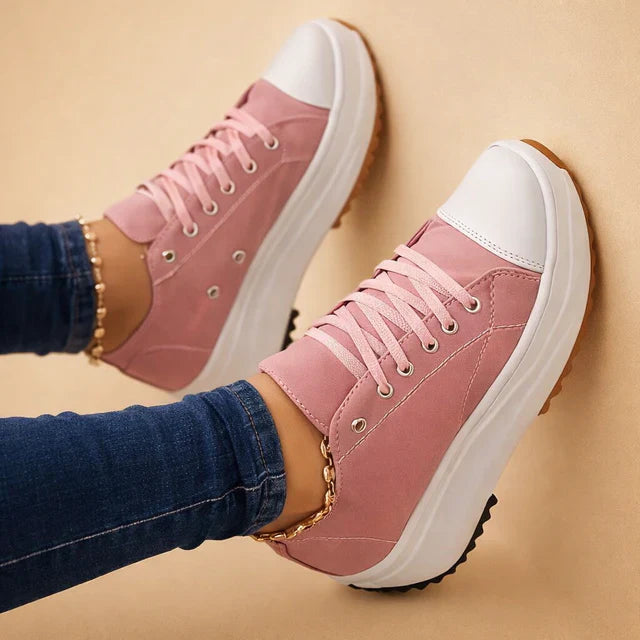 Versatile women's low-top fashion sneakers with lace-up design for everyday wear.