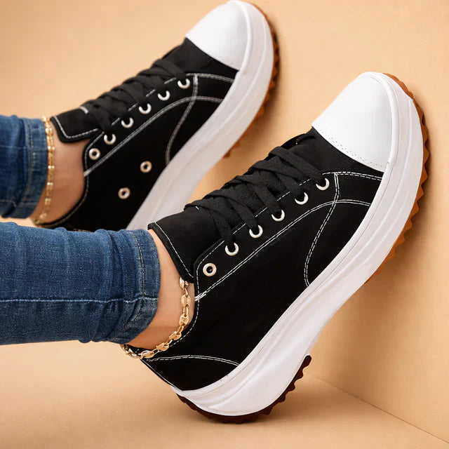 Comfortable women's walking shoes, lace-up casual sneakers ideal for daily activities.