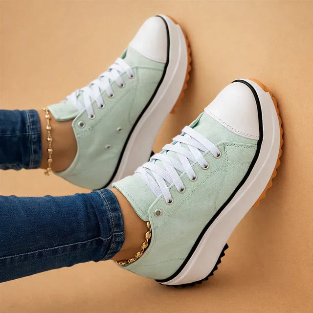 Fashionable women's lace-up trainers, low-top design ensures casual comfort for all seasons.