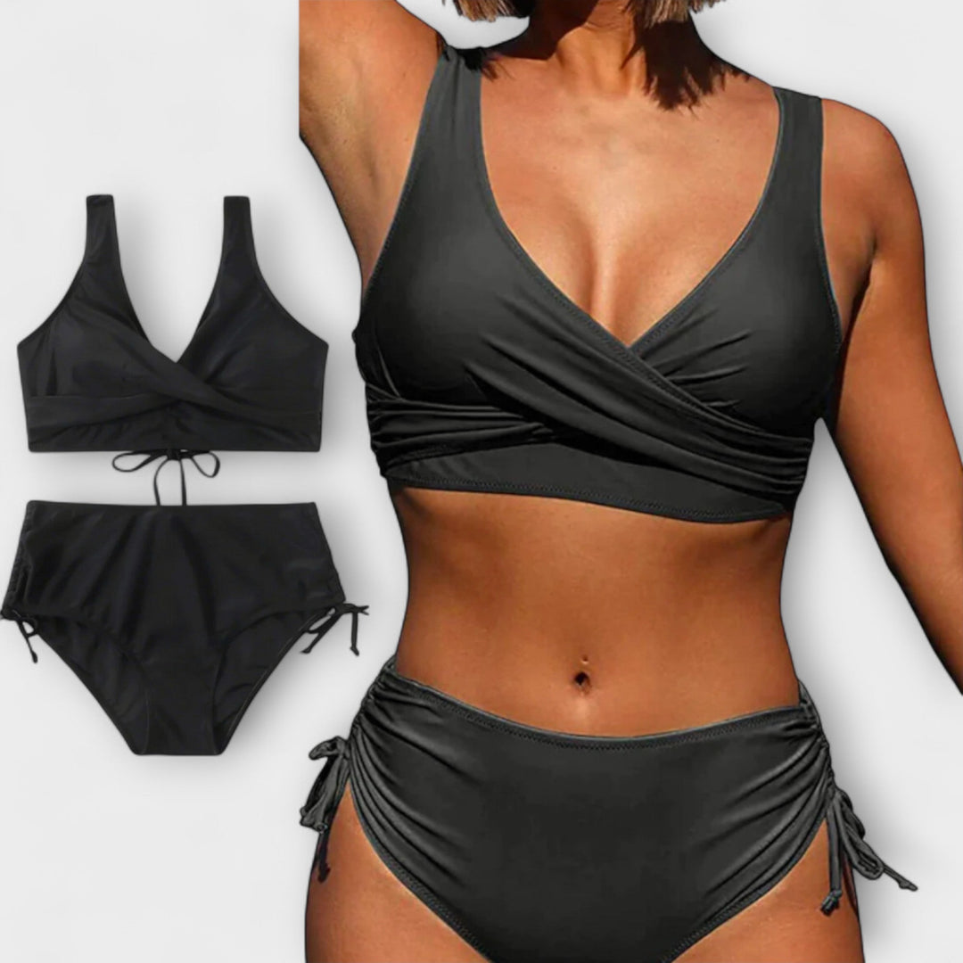 Trendy women's two-piece bikini featuring a V-neck top and mid-rise bottom, perfect for vacation outfits