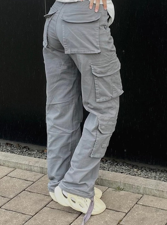 High-waisted women's wide leg cargo pants with ample utility pockets, perfect for casual fashion & comfort.