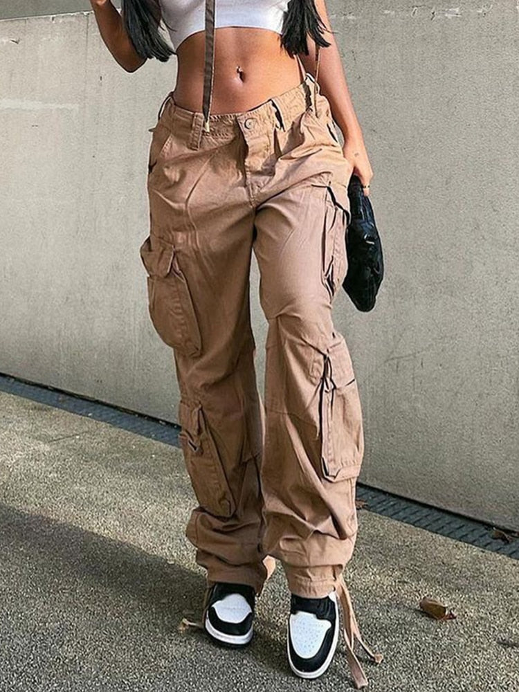 Versatile women's fashion cargo pants with a wide leg and functional utility pockets, great for streetwear.