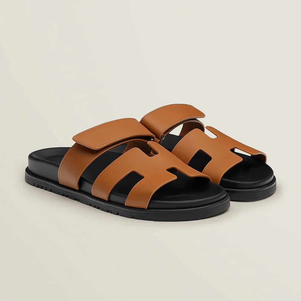 Side profile of a women's summer sandal with adjustable strap, great for beach or vacation.