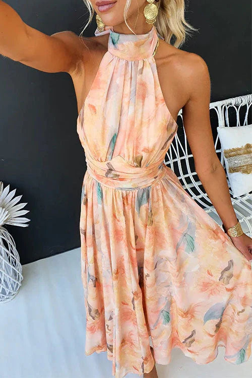 Bohemian-inspired women's halter floral maxi dress, flowy and comfortable for summer days.