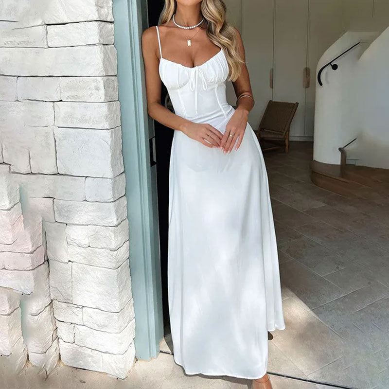 Women's summer sleeveless maxi dress with ruched bodice, perfect for beach or casual wear. Comfortable and elegant.
