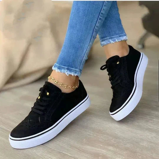 Brown women's lace-up sneakers, designed for daily wear with supportive comfort and casual style.