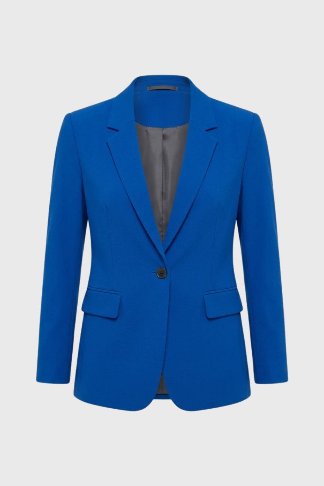 Stylish woman wearing a tailored professional blazer, ideal for smart casual office wear or elegant occasions.