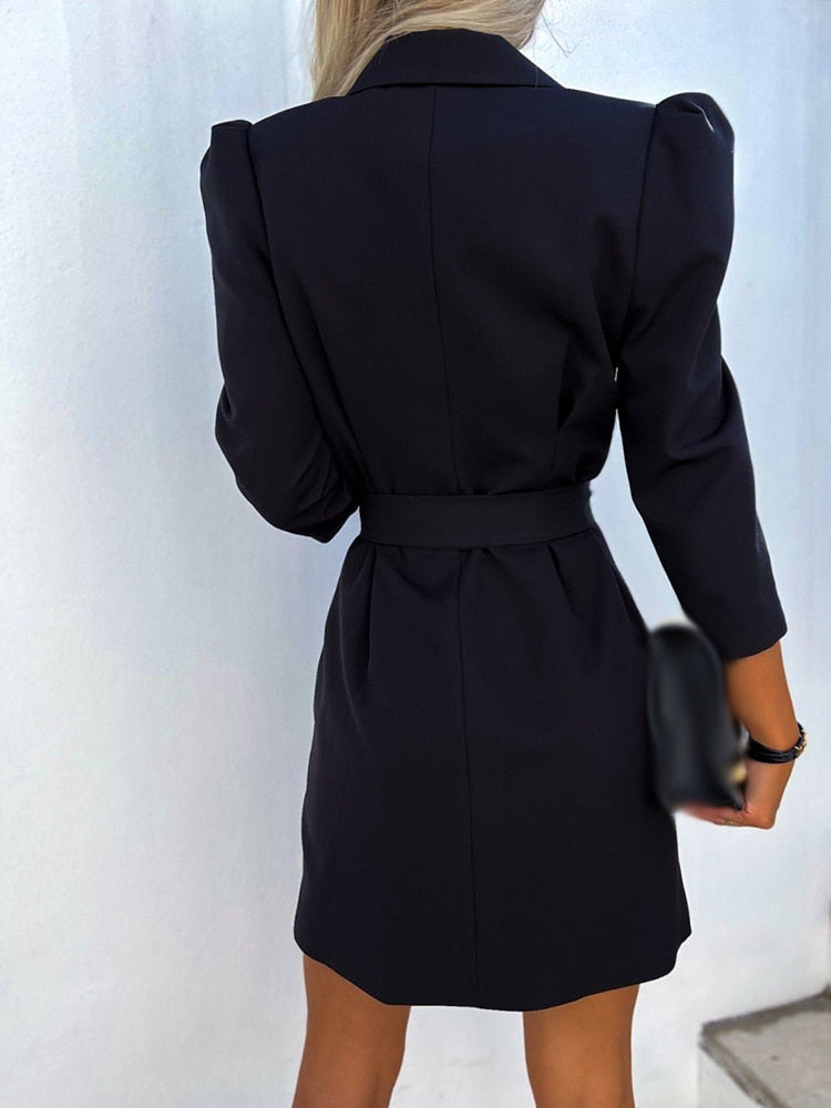 Versatile women's tailored double-breasted blazer dress. Long sleeves, belted waist, perfect for work or elegant events.