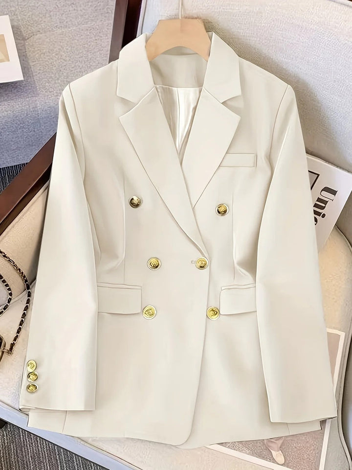 Elegant women's double-breasted blazer, a structured jacket perfect for winter fashion
