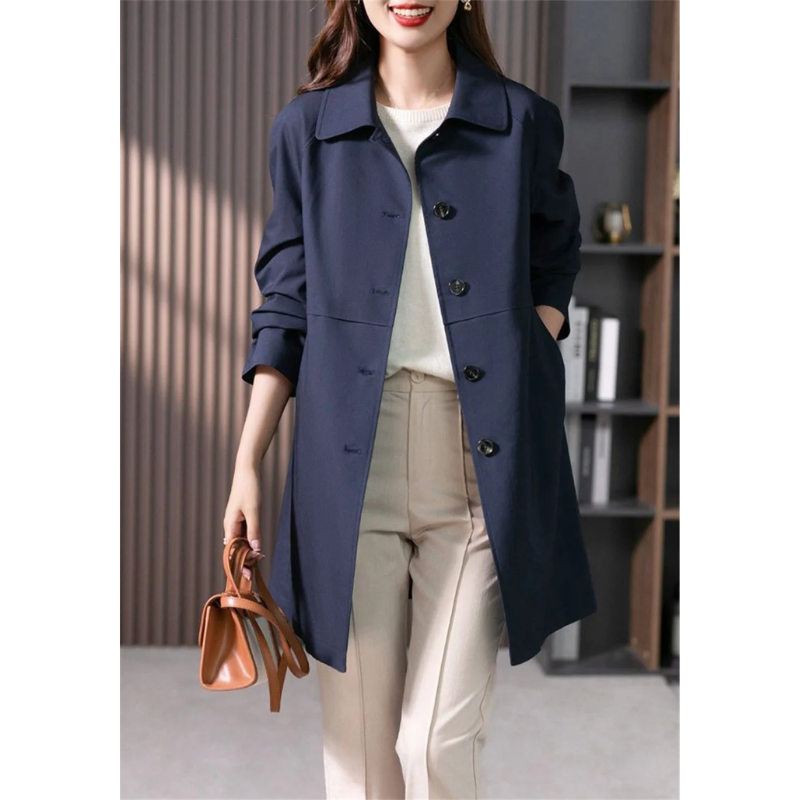 Women's tailored fit mid-thigh trench coat in a classic style, perfect for autumn outerwear or a spring jacket.