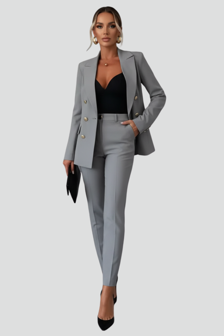 Folded tailored blazer and trousers, displaying the quality of women's professional wear