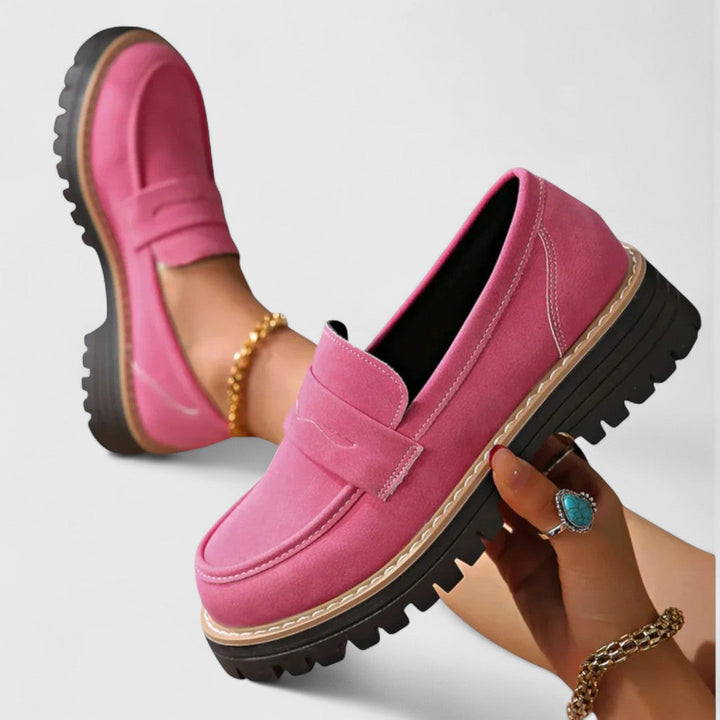 Side view of women's comfortable orthopedic loafers showcasing arch support and breathable casual design.
