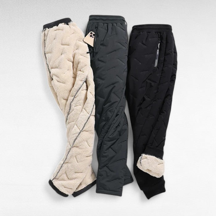 Activewear women's thermal trousers, insulated and waterproof for hiking & skiing in cold winter weather.