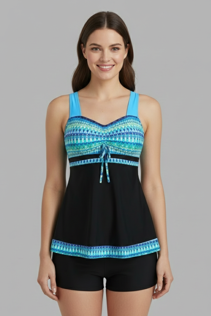 Stylish women's tankini swimsuit with tie front and matching black shorts.