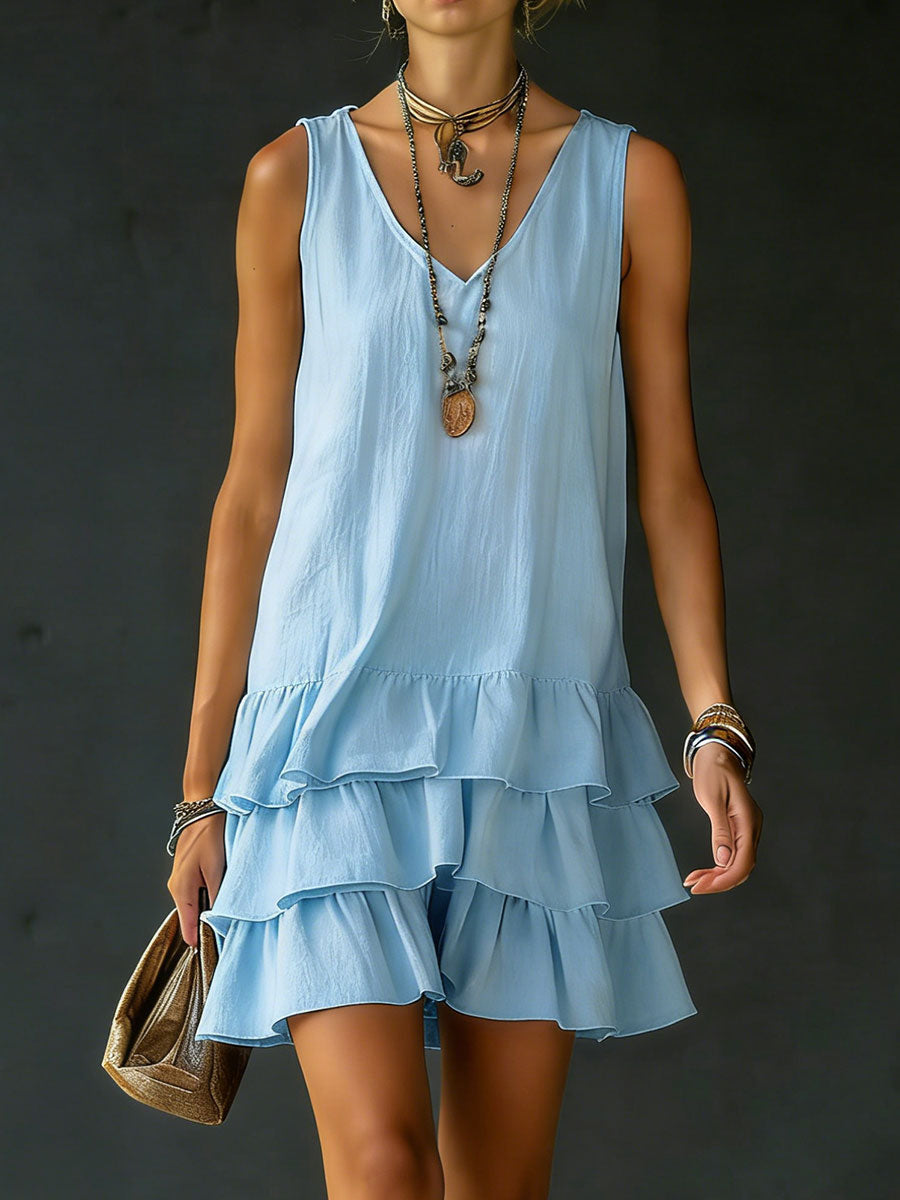 Stylish women's tiered ruffle V-neck mini dress, sleeveless, great for casual outings, summer, or vacation.