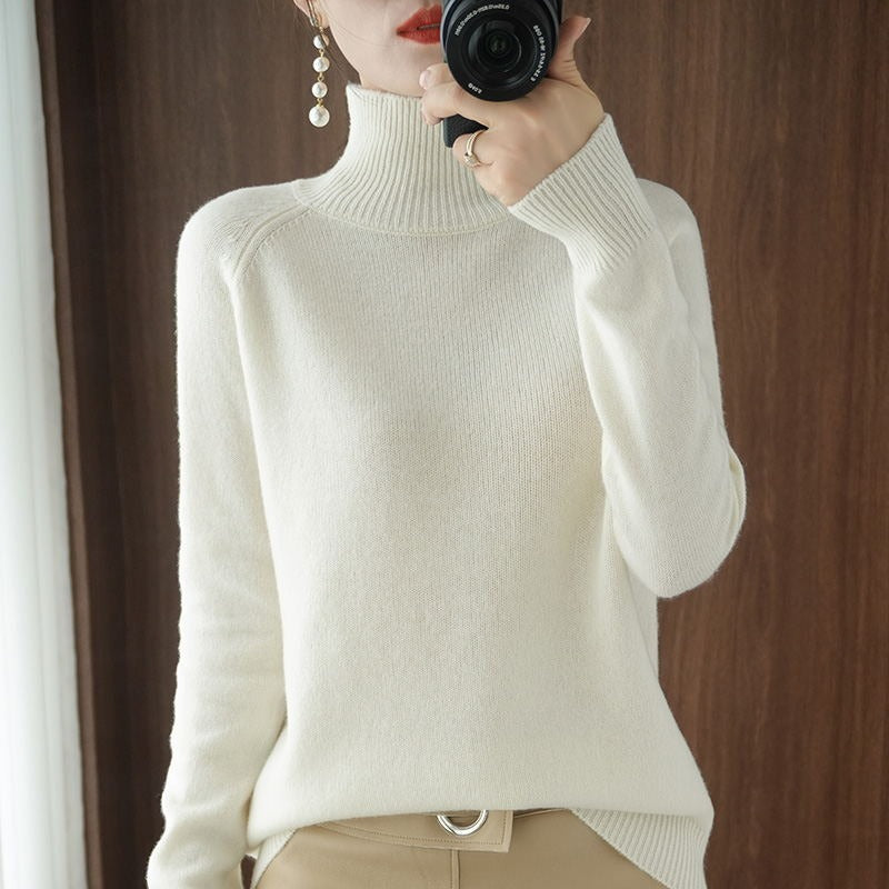Women's timeless black turtleneck sweater, perfect for effortless classic style and comfortable everyday wear.