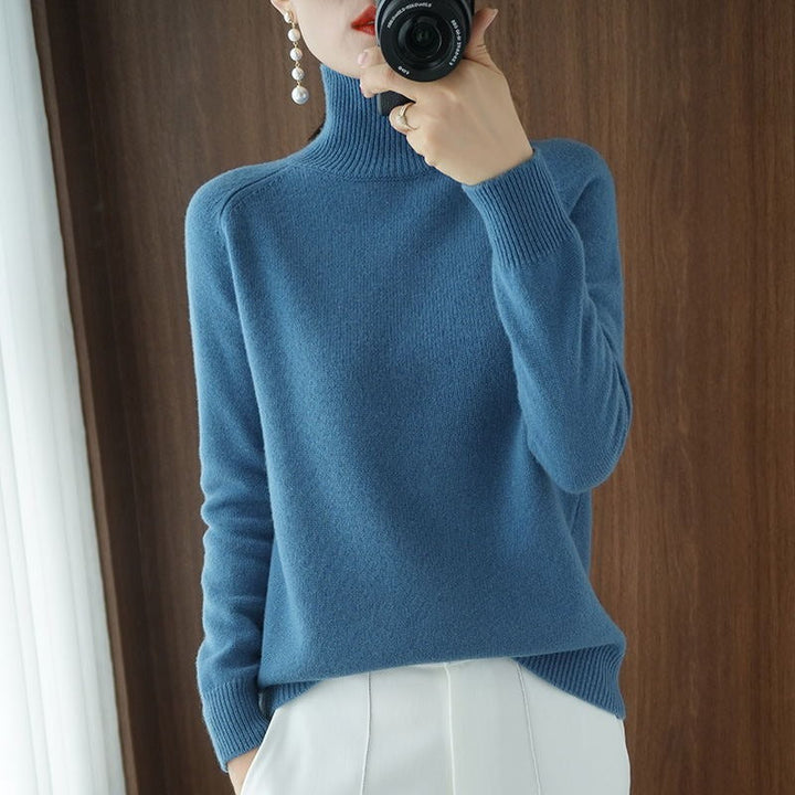 Elegant women's turtleneck sweater in a rich color, designed for classic style and versatile casual chic.